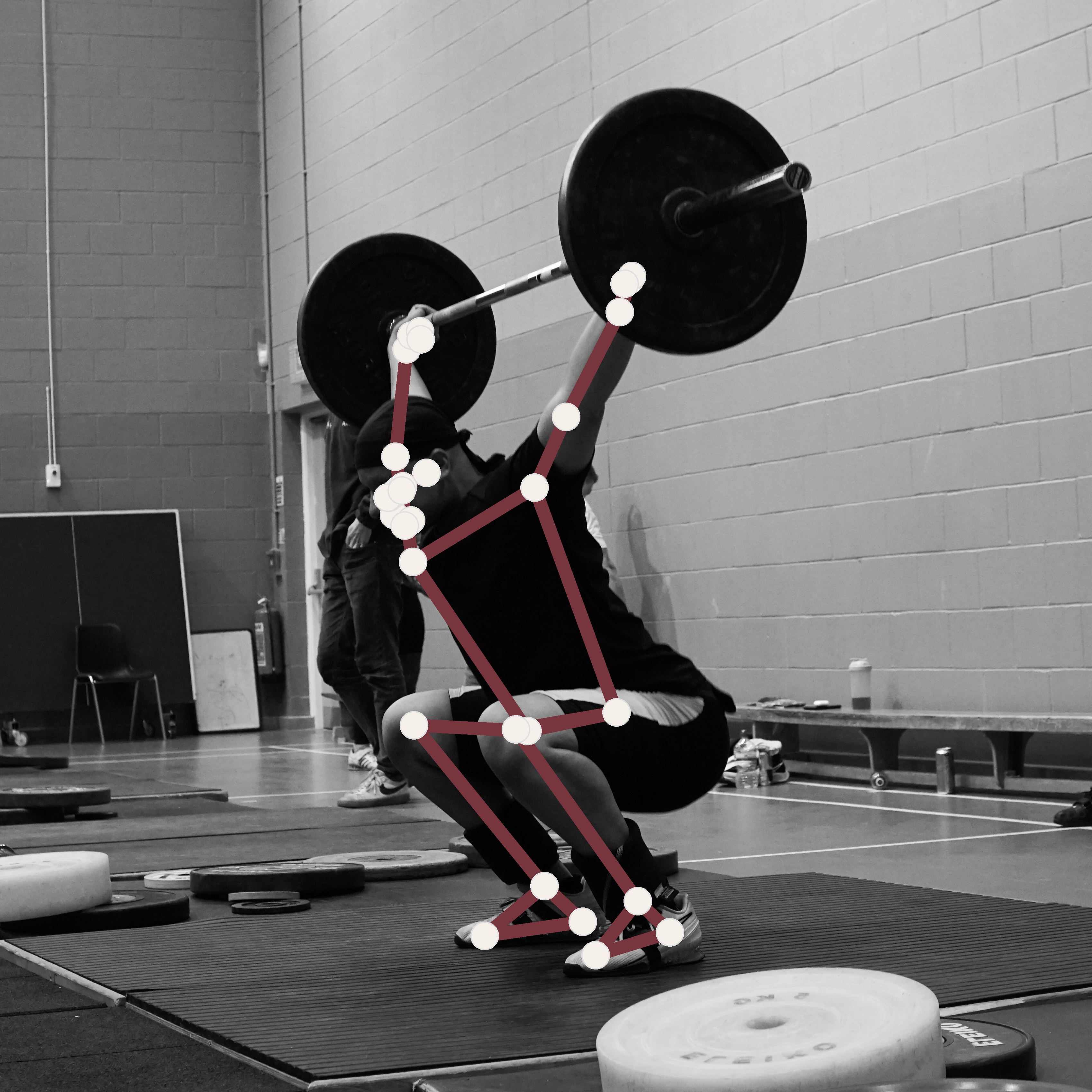 Athlete performing snatch with markerless pose overlaid on top.